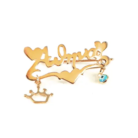 Rose gold plated silver brooch with your name and hearts, crown, eye