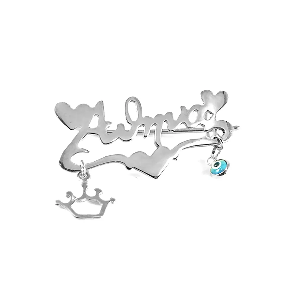 Platinum plated silver brooch with your name and hearts, crown, eye