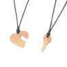 Double heart necklace with key in silver 925 rose gold plated with cord Double heart necklace with key in silver 925 rose gold plated with cord
