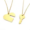 Double heart necklace with key in silver 925 gold plated Double heart necklace with key in silver 925 gold plated