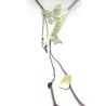 Handmade butterfly-shaped brass necklace with green patina on brown cord Handmade butterfly-shaped brass necklace with green patina on brown cord