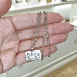 Silver platinum plated rectangle pendant with engraving of a children's painting, stainless steel chain
