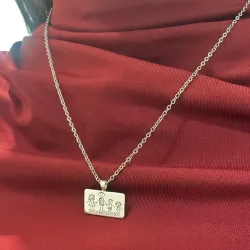Silver platinum plated rectangle pendant with engraving of a children's painting, stainless steel chain