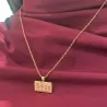 Silver rose gold plated rectangle pendant with engraving of a children's painting, stainless steel chain
