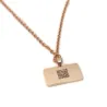 Silver rose gold plated rectangle pendant with engraving of a children's painting, stainless steel chain