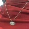 Rectangle pendant made of Nickel silver with engraving of a children's painting, stainless steel chain