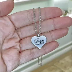 Heart pendant made of Nickel silver with engraving of a children's painting, stainless steel chain