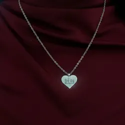 Heart pendant made of Nickel silver with engraving of a children's painting, stainless steel chain