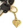 Key ring with photo engraving on brass heart, steel ring