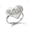 Silver ring with engraving of a children's drawing on a heart