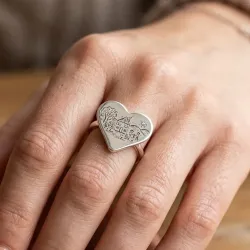 Silver ring with engraving of a children's drawing on a heart