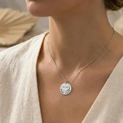 Necklace with silver discs with date or names