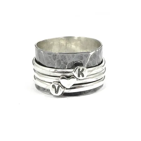 Spinner ring with monograms