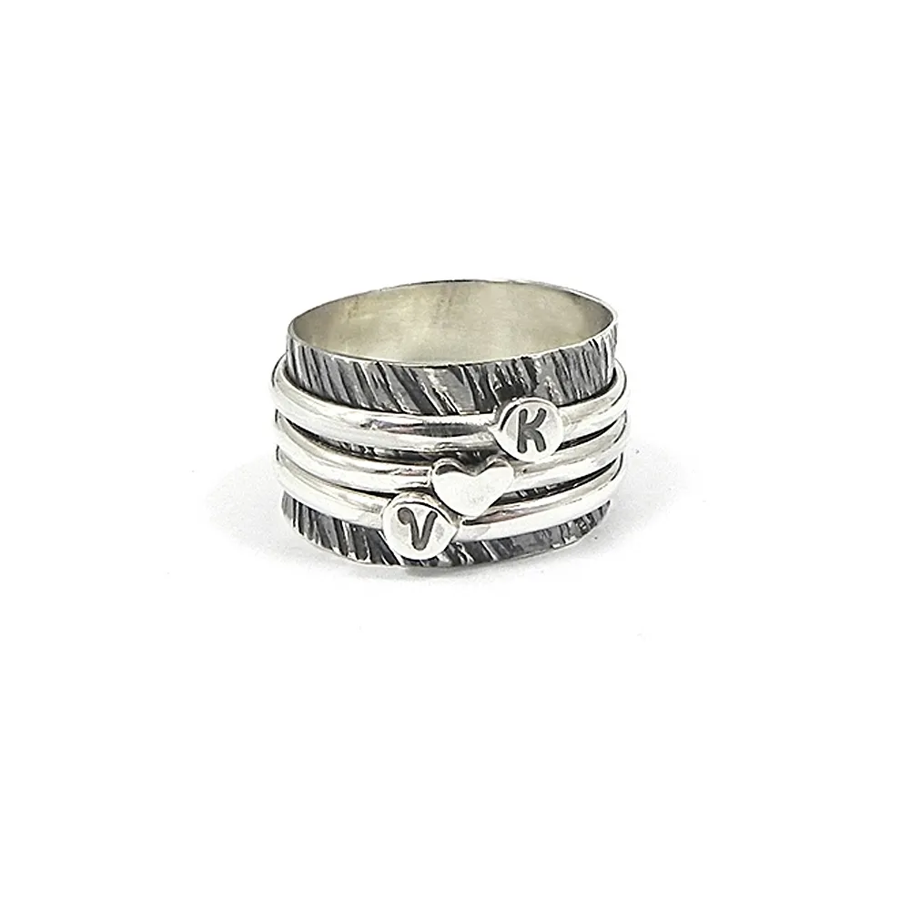 Spinner ring with monograms Spinner ring with monograms