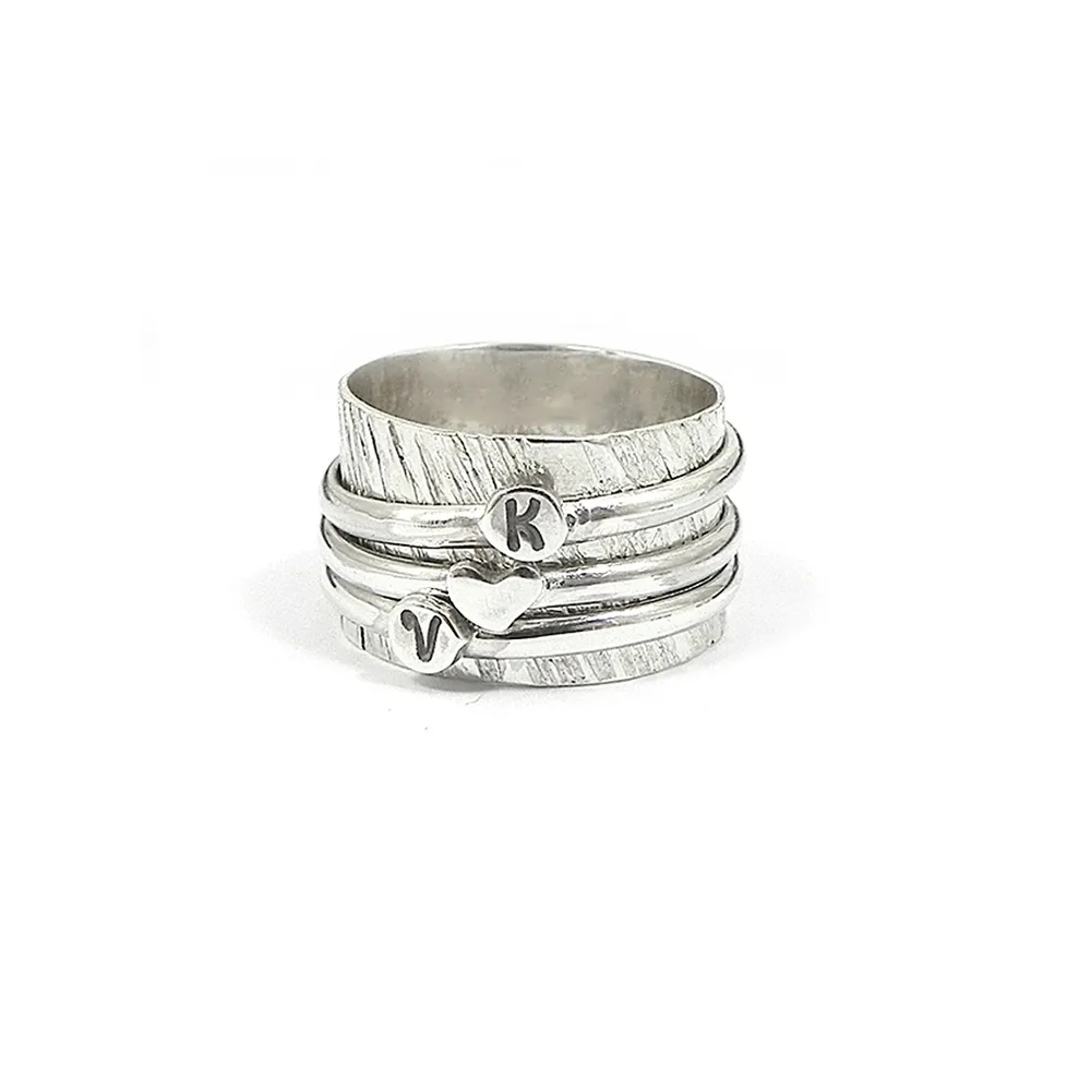Spinner ring with monograms Spinner ring with monograms