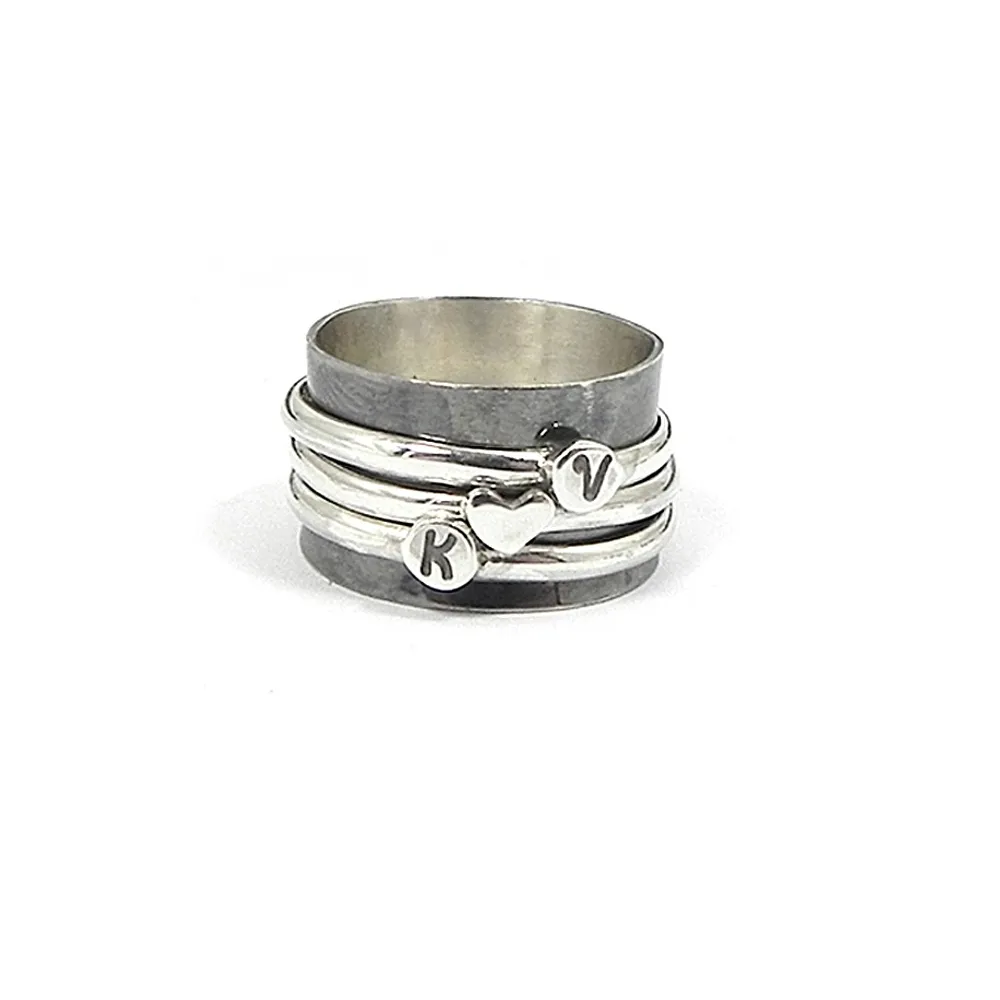 Spinner ring with monograms Spinner ring with monograms