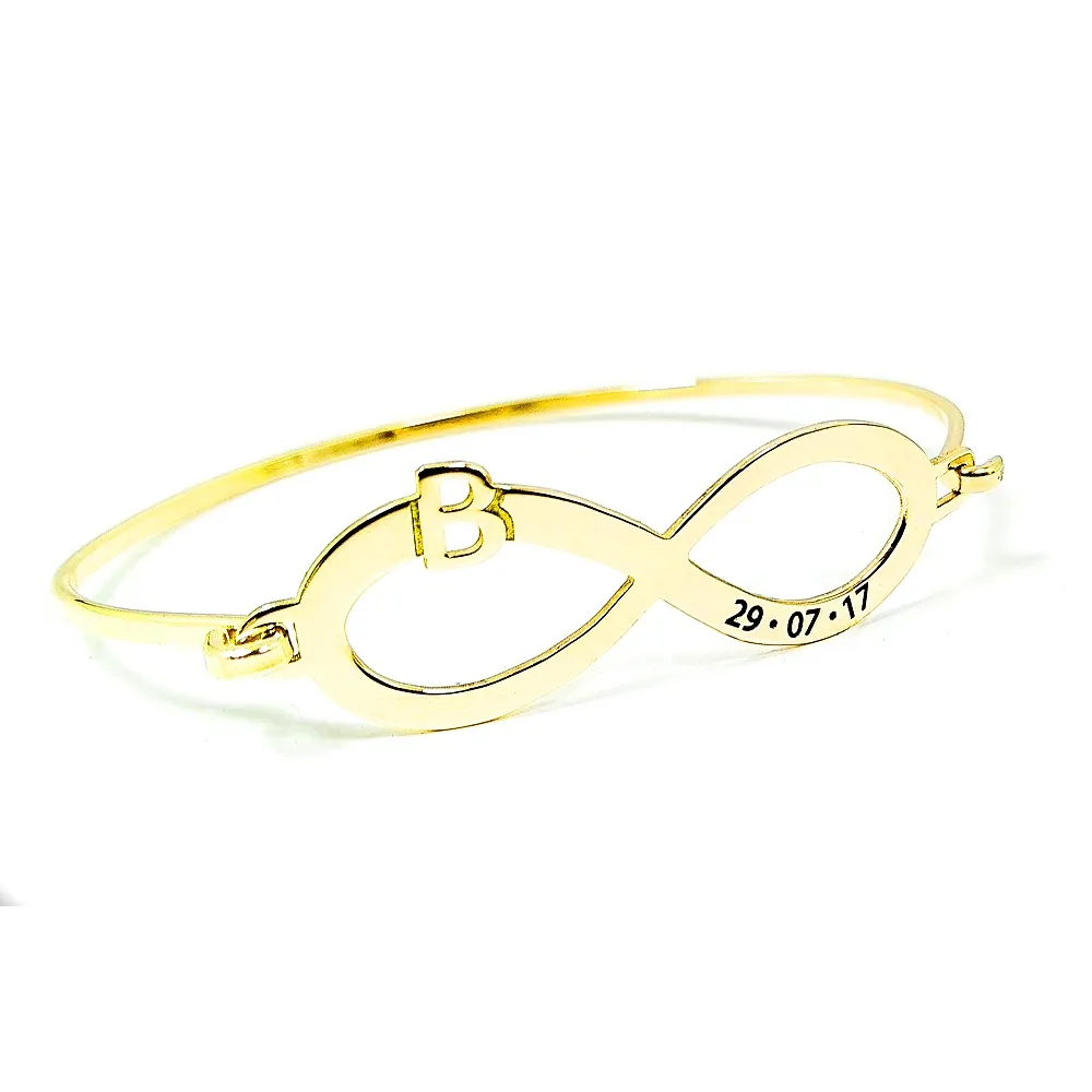 Bangle bracelet with infinity, monogram and date on sterling silver gold plated Bangle bracelet with infinity, monogram and date on sterling silver gold plated