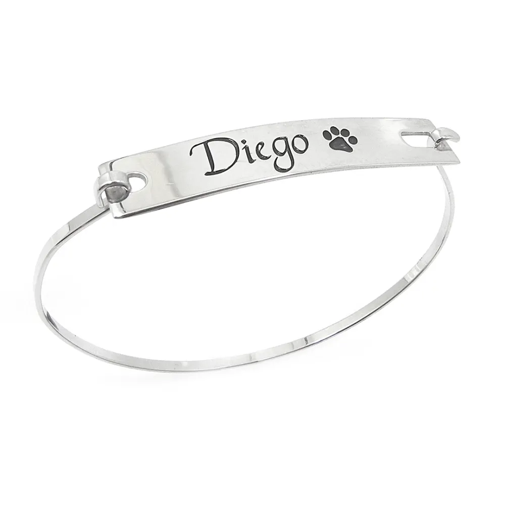 Bangle bracelet with engraved ID tag in rose gold plated sterling silver Bangle bracelet with engraved ID tag in rose gold plated sterling silver