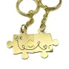 Double puzzle keychain with monograms made of brass with stainless steel ring