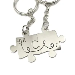 Double puzzle keychain with monograms made of brass with stainless steel ring