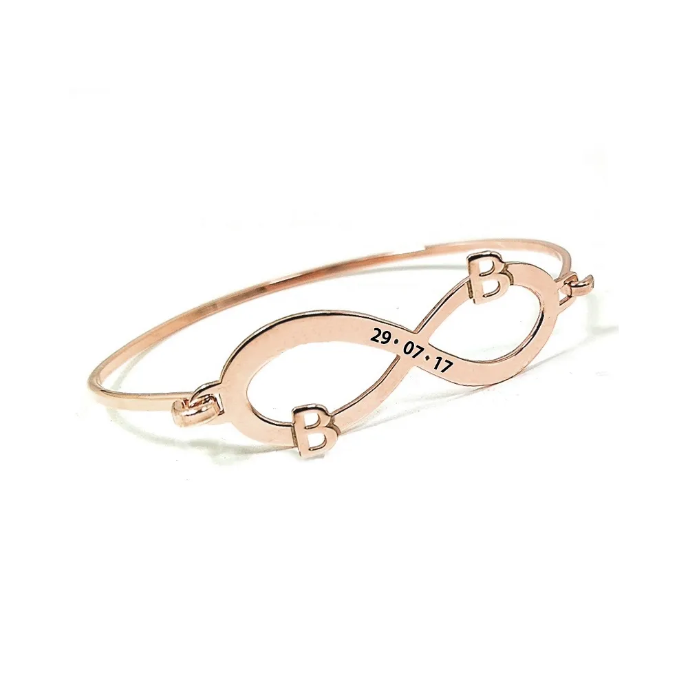 Bangle bracelet with infinity, monograms and date on rose gold plated silver Bangle bracelet with infinity, monograms and date on rose gold plated silver