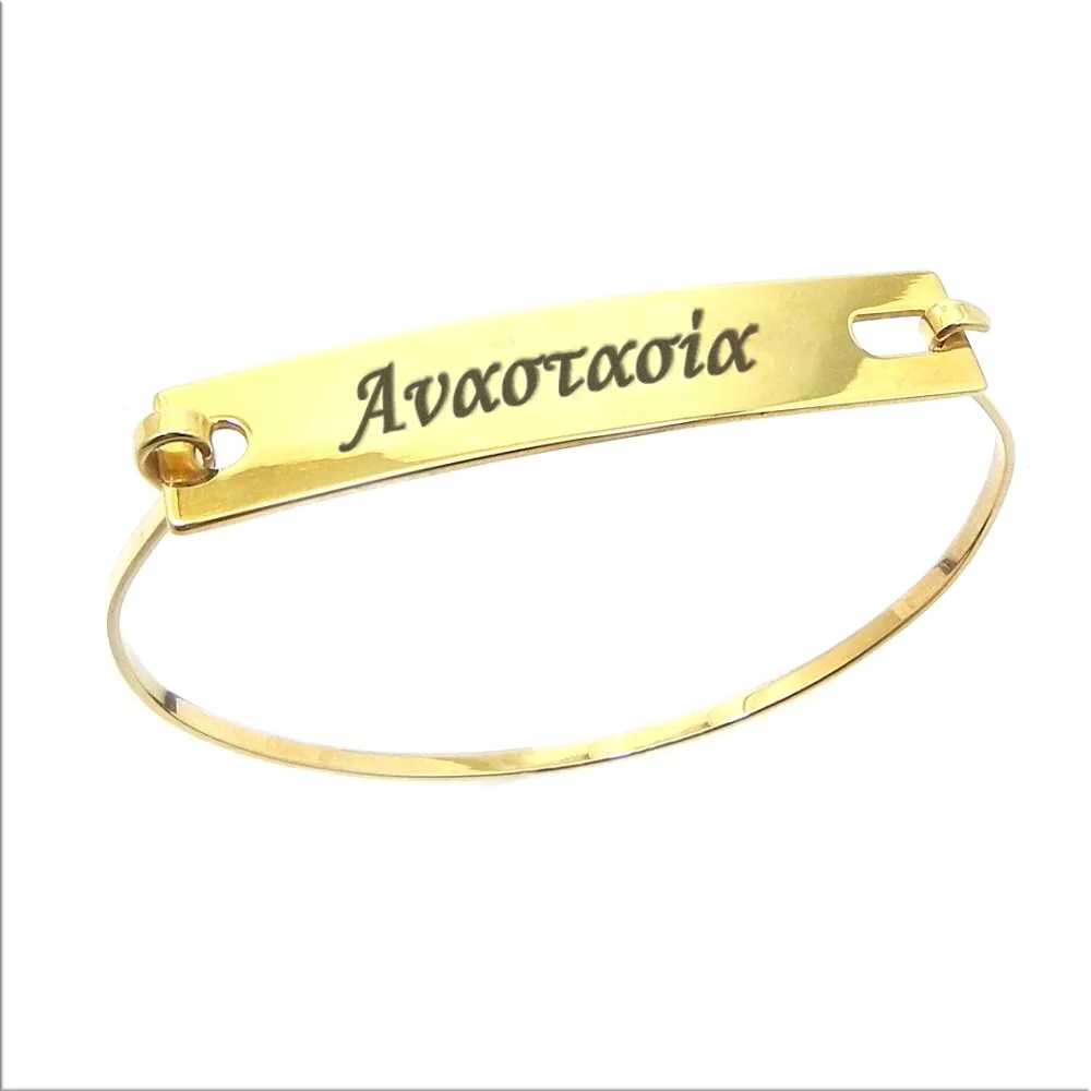 Bangle bracelet with engraved ID tag Bangle bracelet with engraved ID tag