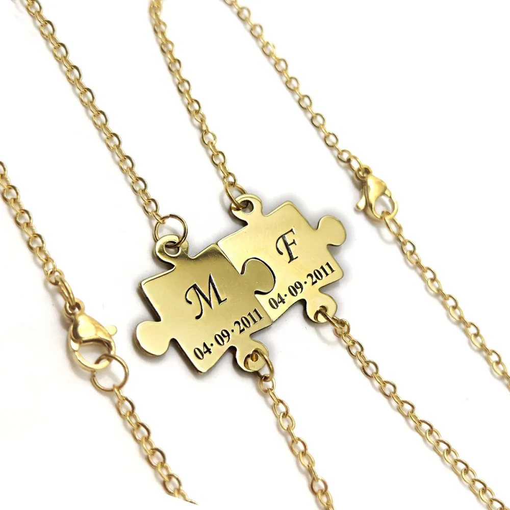 Set of 2 bracelets with silver gold plated puzzle pieces, stainless steel chain Set of 2 bracelets with silver gold plated puzzle pieces, stainless steel chain