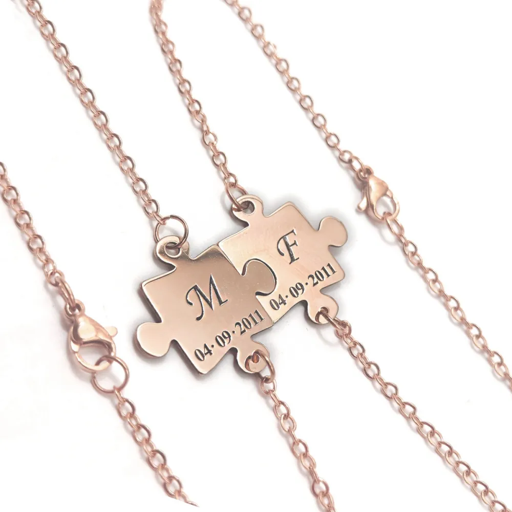 Set of 2 bracelets with silver rose gold plated puzzle pieces, stainless steel chain Set of 2 bracelets with silver rose gold plated puzzle pieces, stainless steel chain