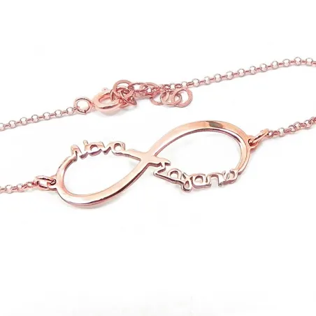 Silver rose gold plated infinity bracelet with the words "Νονά σαγαπω"