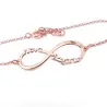 Silver rose gold plated infinity bracelet with the words "Νονά σαγαπω" Silver rose gold plated infinity bracelet with the words "Νονά σαγαπω"