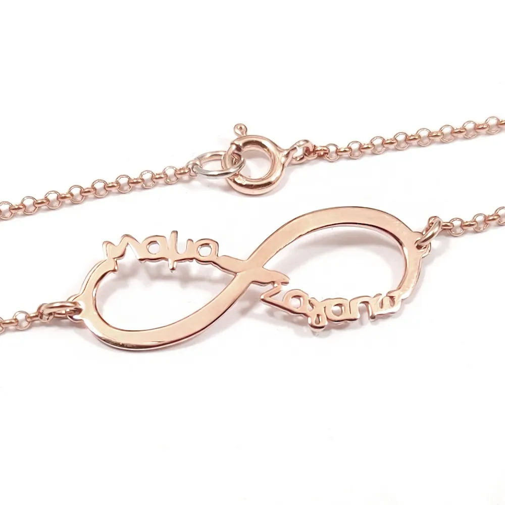 Silver rose gold plated infinity bracelet with the words "Μαμά σαγαπω"