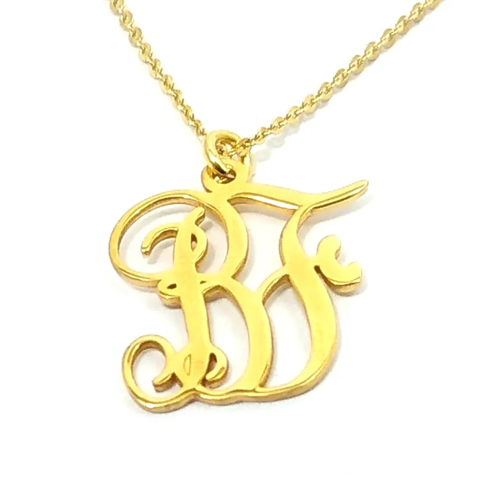 Sterling Silver necklace with 2 calligraphic monograms