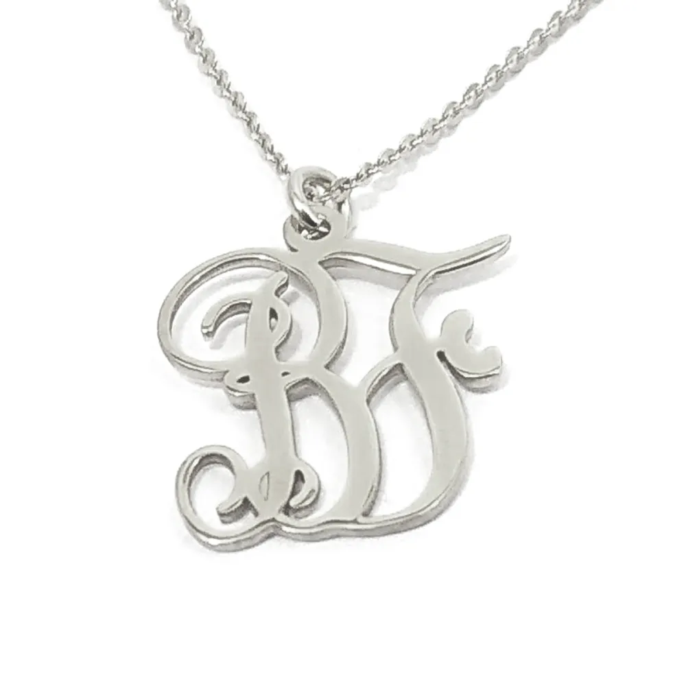 Gold plated silver necklace with 2 initials, heart and gold plated sterling silver chain Gold plated silver necklace with 2 initials, heart and gold plated sterling silver chain