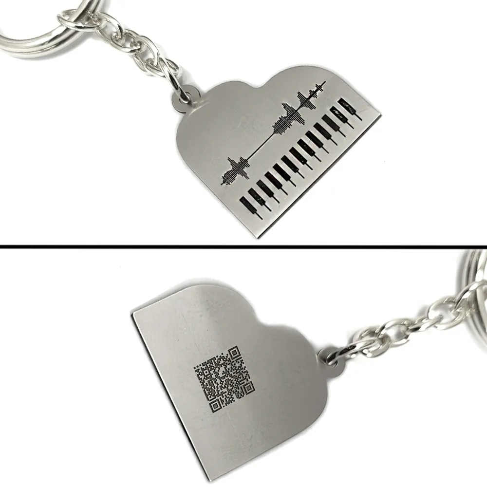 Nickel silver piano keychain with your personal message soundwave + QRcode engraved Nickel silver piano keychain with your personal message soundwave + QRcode engraved