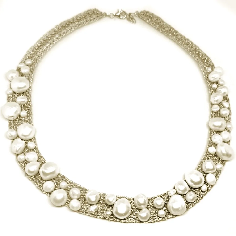 Handmade necklace with knitted wire, silver, steel and pearls Handmade necklace with knitted wire, silver, steel and pearls