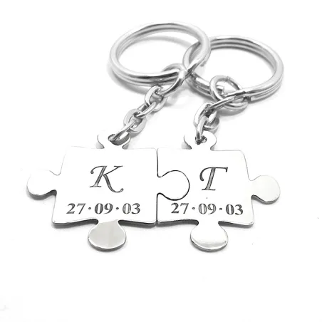 Double keyring with sterling silver puzzle pieces with monograms and date
