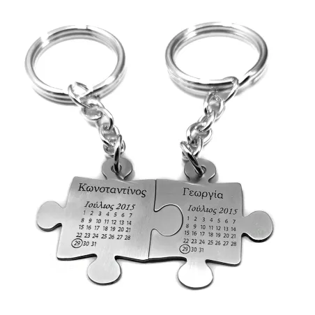 Double keyring with nickel silver puzzle pieces with names and date