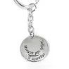 Keychain with nickel silver disks engraved "Μπαμπά μην τρέχεις"