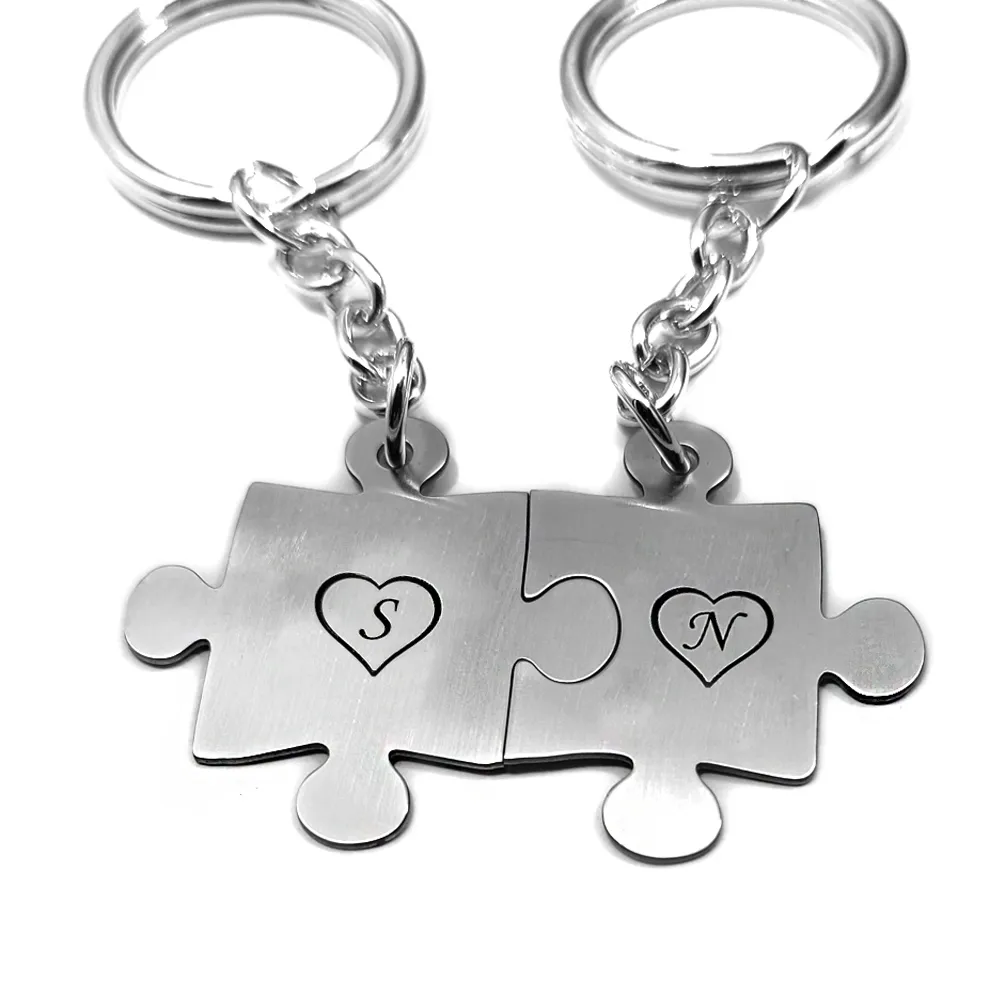 Double keyring with nickel silver puzzle pieces with monograms