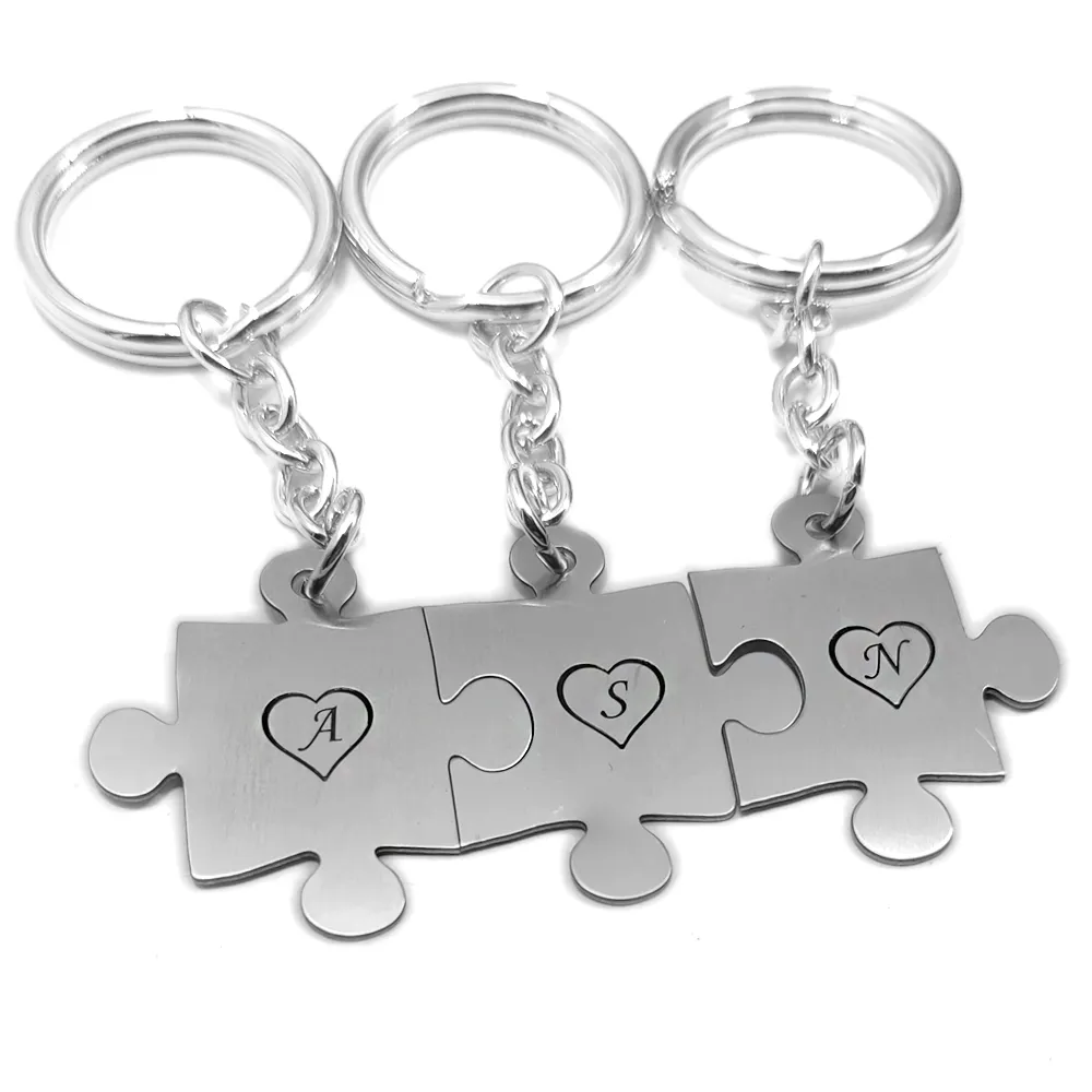 Triple keyring with nickel silver puzzle pieces with monograms