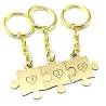Triple keyring with brass puzzle pieces with monograms