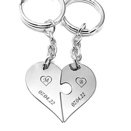 Double keyring with sterling silver heart puzzle pieces with monograms