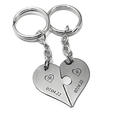 Double keyring with nickel silver heart puzzle pieces with monograms and date