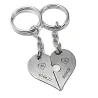 Double keyring with nickel silver heart puzzle pieces with monograms and date