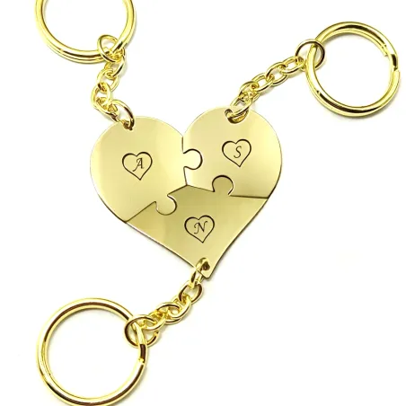Triple keyring with brass heart puzzle pieces with monograms