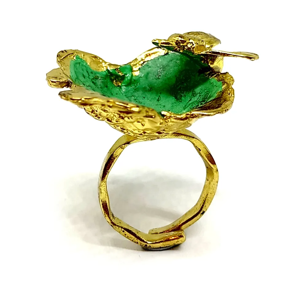 Brass ring with green enamel Brass ring with green enamel