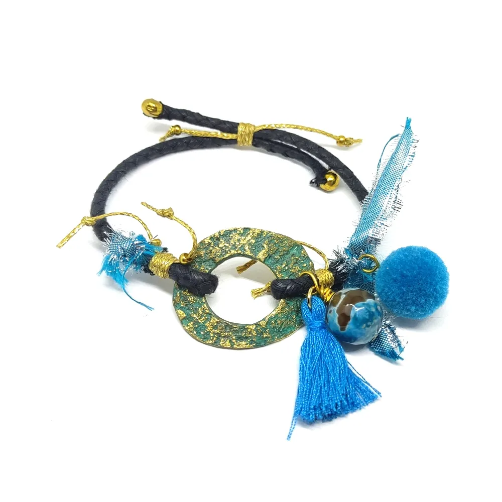 Handmade brass bracelet with cord Handmade brass bracelet with cord